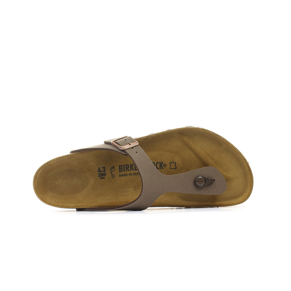 Sandalia BIRKENSTOCK Gizeh es un clásico genuino y un todoterreno elegante. Nuestra elegante sandalia combina un agarre óptimo con un diseño minimalista y moderno. La parte superior está hecha del material sintético Birko-Flor® resistente a la piel y resistente al desgaste en un sofisticado aspecto de nubuck que cuenta con una textura y un color que casi podrían confundirse con el cuero real.